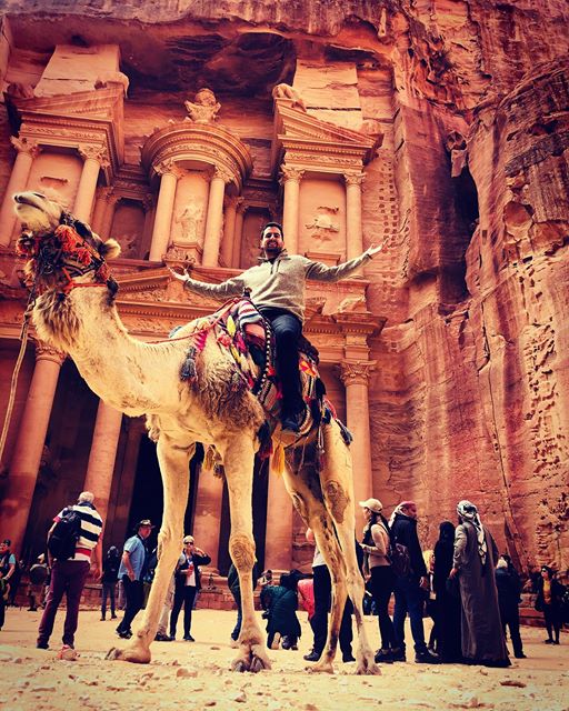 Paul riding a camel